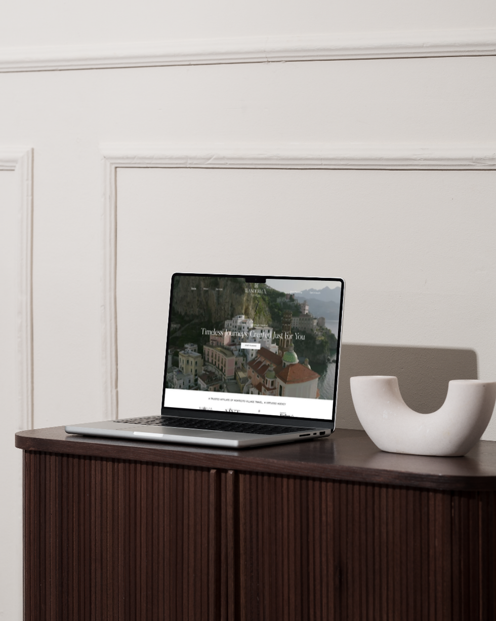 laptop on wooden table