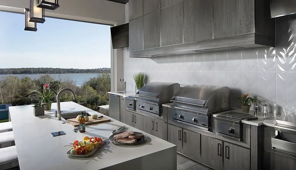 riverside-outdoor-kitchen-with-long-grill-run-and-prep-island.webp