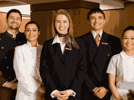 Smiling team of household staff including maid, chef, manager, and concierge in Dubai home service agency