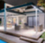 Une pergola bioclimatique éclairée par des lampes LED.