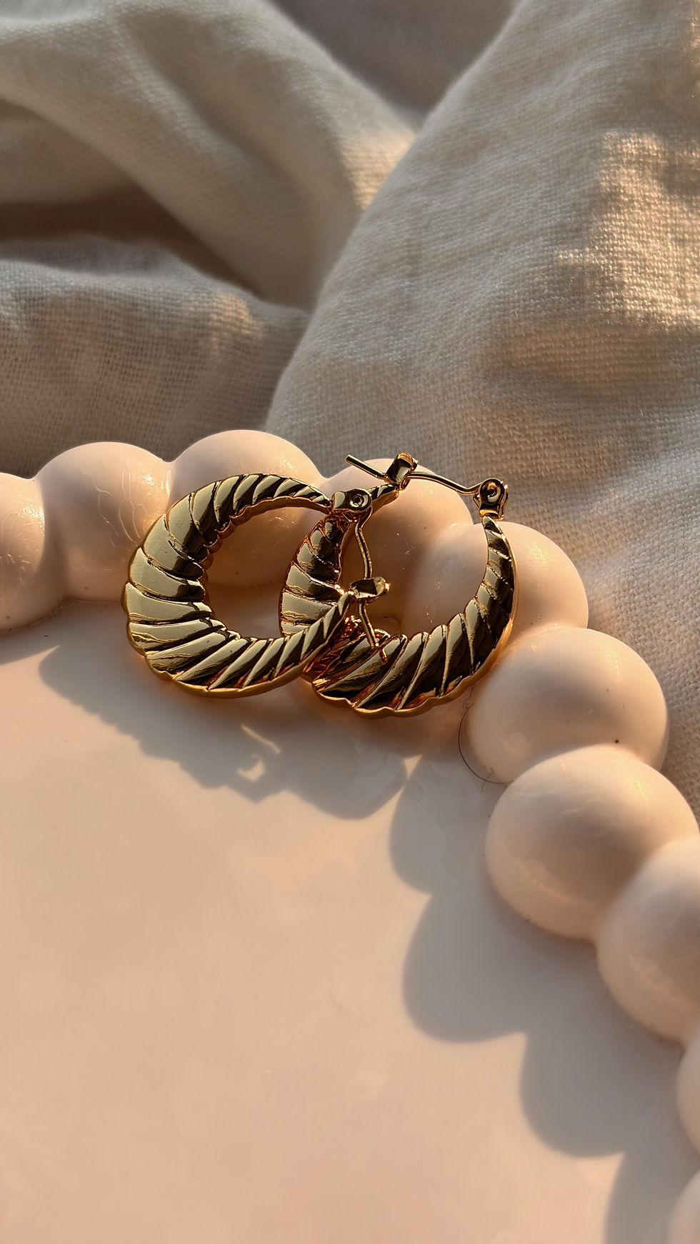 twist gold hoops