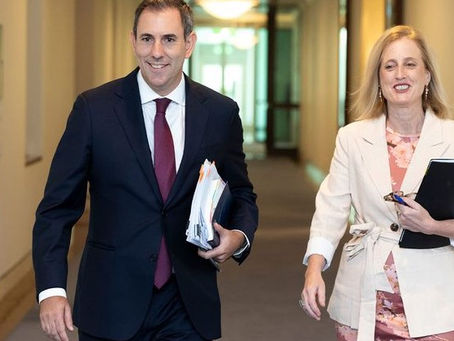 Budget's bottom line improves as household pressures remain
