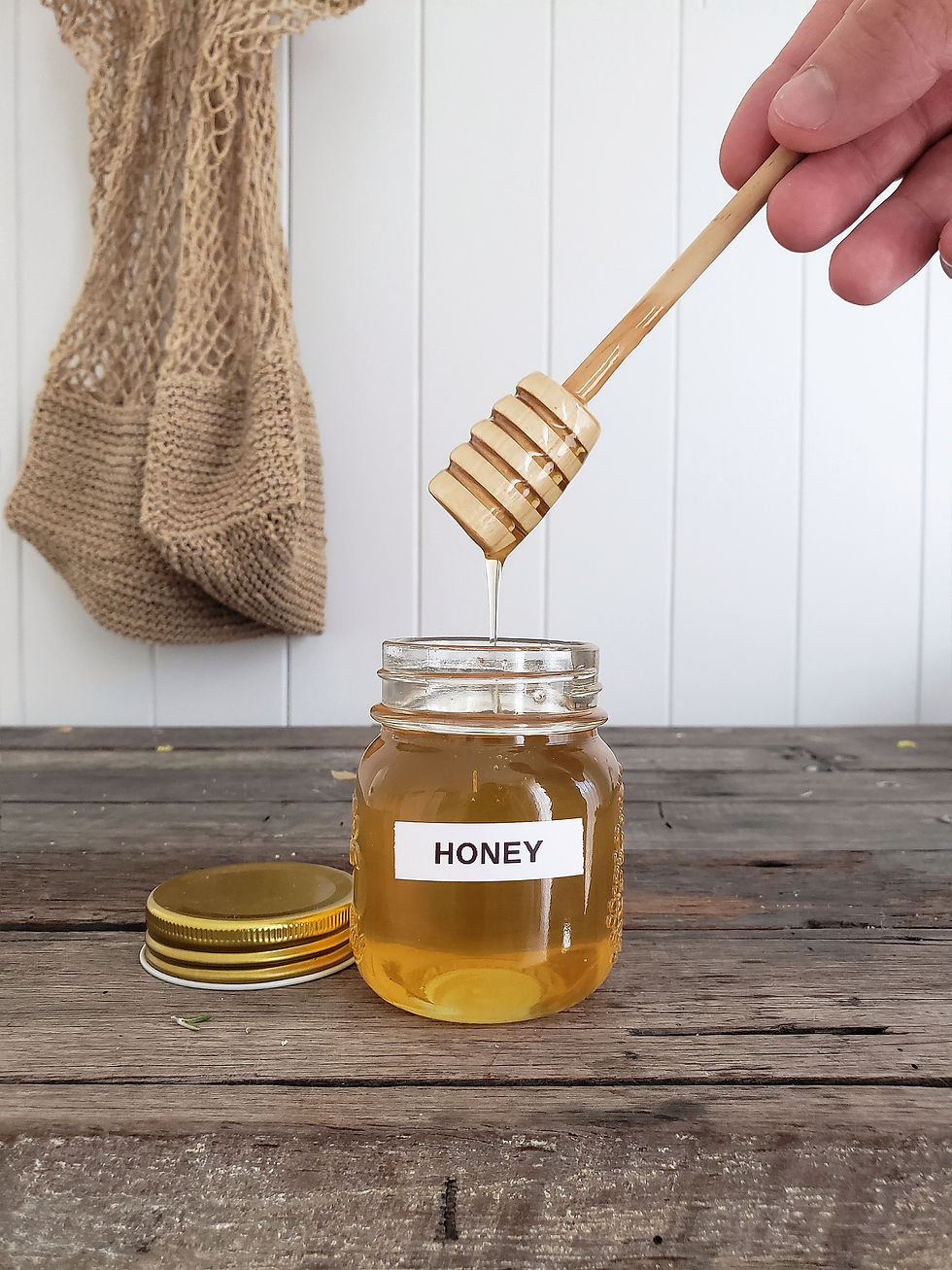 a jar of backyard wild flower honey