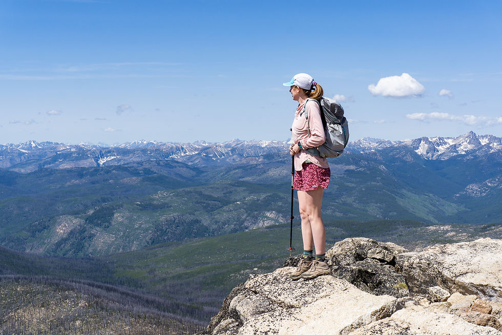 Katie surveying the distant Cascades