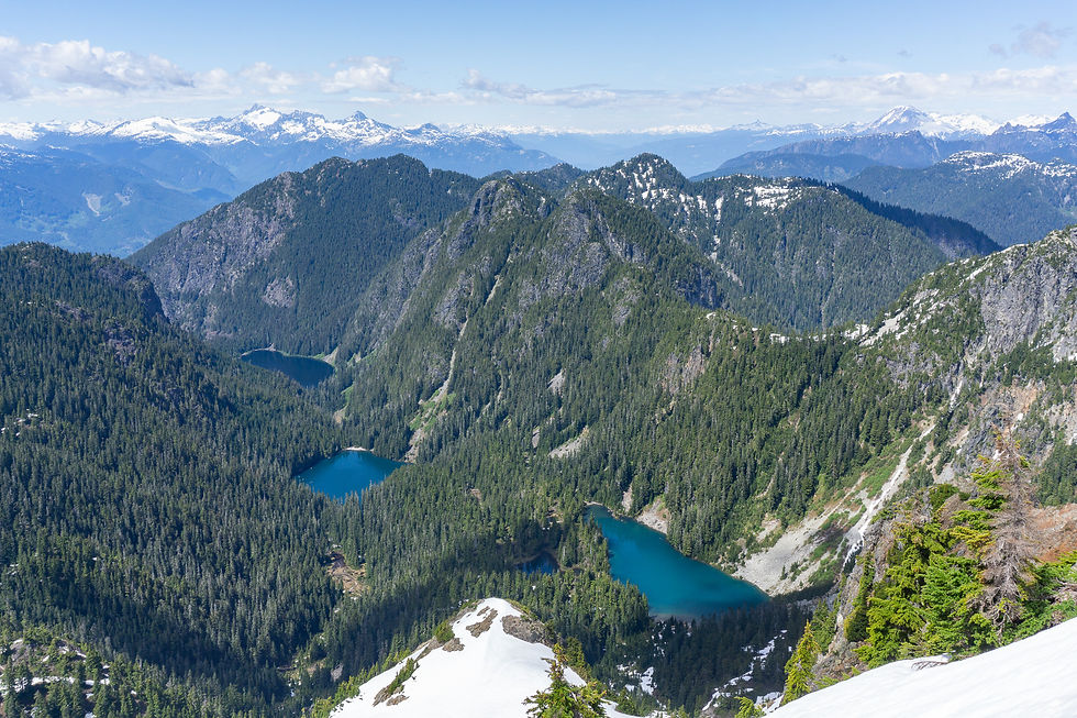Beautiful lake basin with the Tantalus Range and Garibaldi in the distance