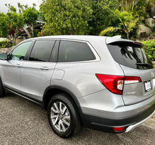 Makana Maui Adventures, Silver Honda Pilot EX-L SUV parked on the street