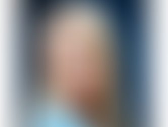 Kim Peacock - Broker/Owner of RE/MAX Dolphin Realtors