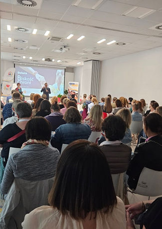 Zdjęcie przedstawia uczestników Debaty