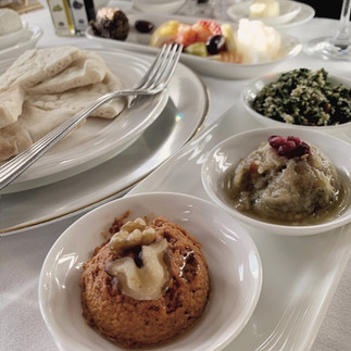 Emirates First Class traditional Mezze Platter of hummus dips, spreads, cheeses with pita and raw vegetables for dipping.