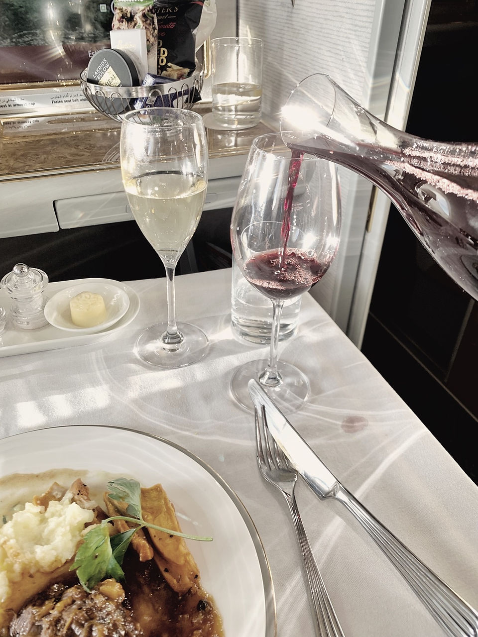 The crew recommended I pair my main dish with a glass of the French Chateau Montrose 2005, a red wine which retails for $300 per bottle.