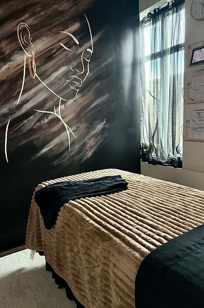 Bed and mural located in Madrone Beauty's private room at their Battle, Ground WA location