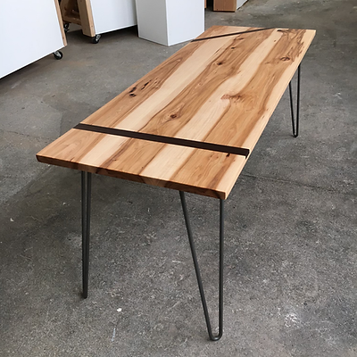 Table with inlays and metal feet