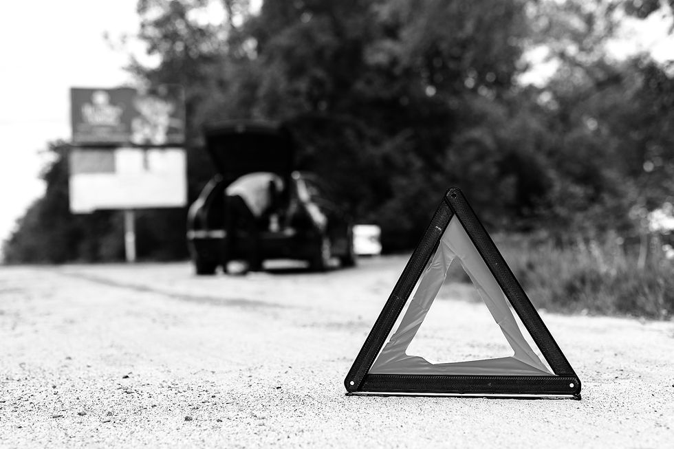 car-with-problems-red-triangle-warn-other-road-users_edited.jpg
