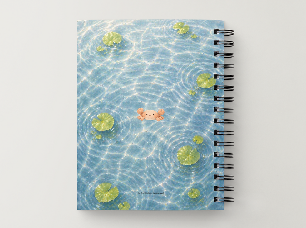 Thumbnail: Jojo & Jacklyn notebook back cover with crab in water.