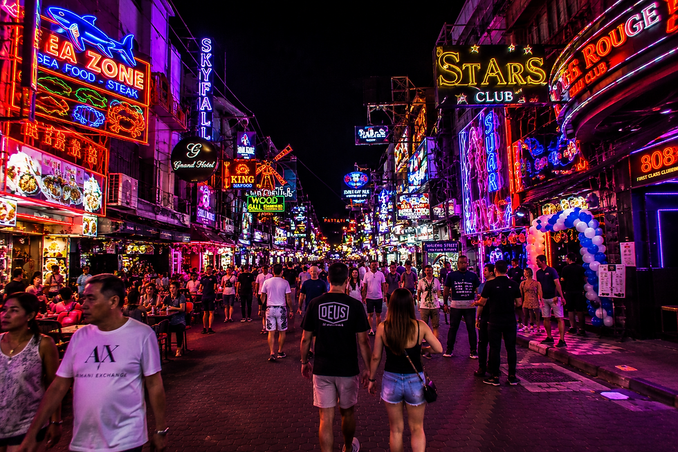 Walking Street Pattaya night walk with neon signs and crowds