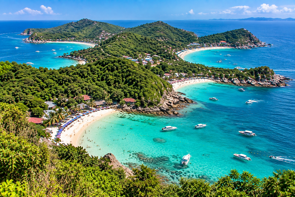 Best beaches on Koh Larn with turquoise water, sandy coves, swimmers and tropical green hills