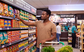 Guy Standing in Spar.png