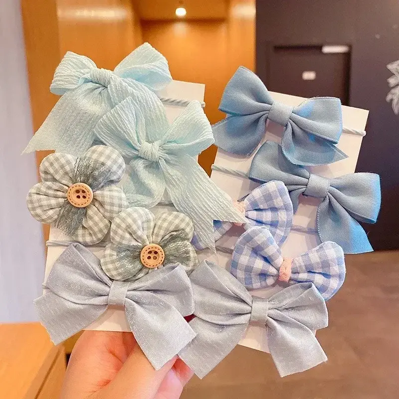Thumbnail: Baby Girl Cute Colors Flower Hair Bands, light blue and plaid design.