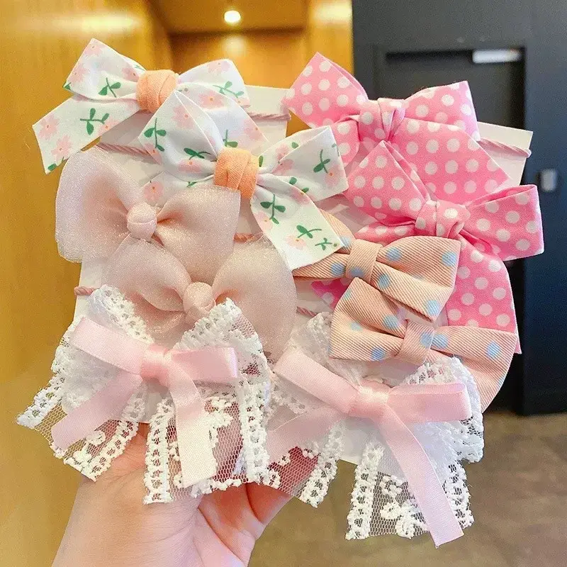 Thumbnail: Assorted pink and white lace, polka dot, flower baby girl hair bows.