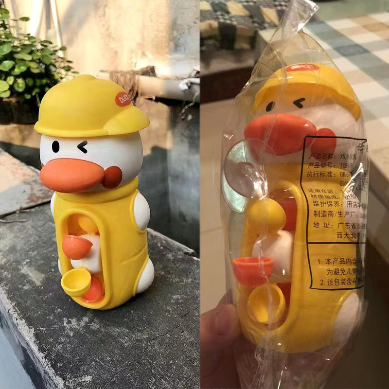 Thumbnail: Yellow duck toy with construction hat, in packaging