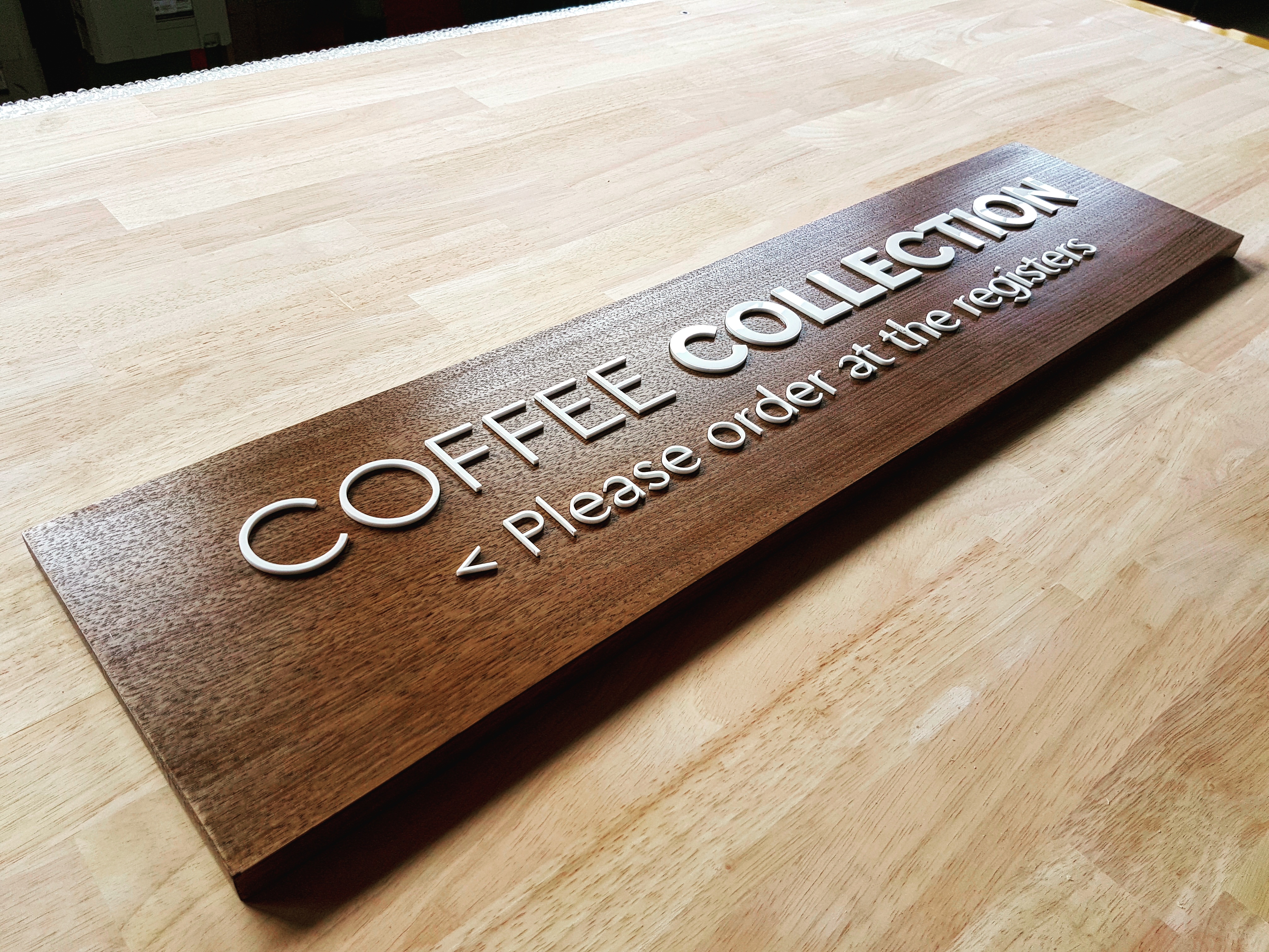 custom wooden signage