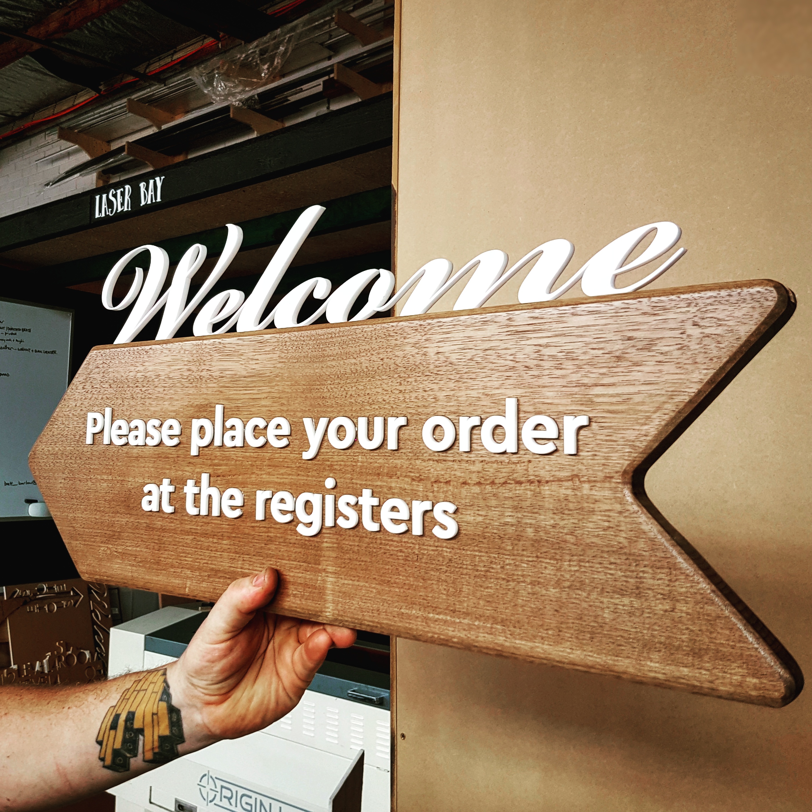 welcome sign for a cafe.