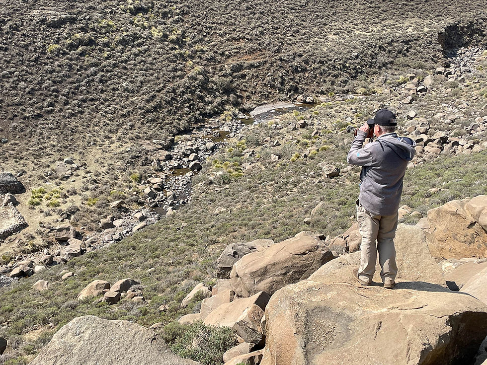 Stuart standing on a rock I did not trust myself to hop onto.