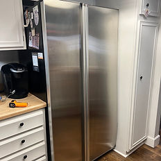 Modern French door refrigerator, serviced by our expert repair team