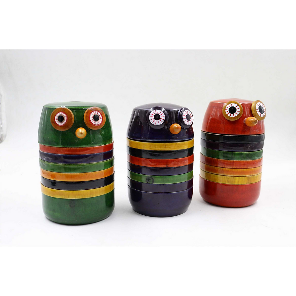 Three colour variants of wooden owl coaster sets with holders