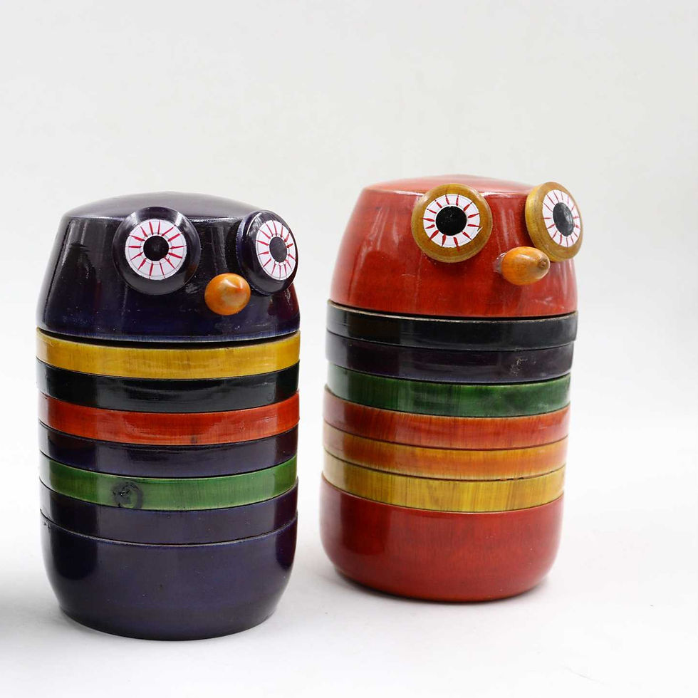 Thumbnail: Handcrafted owl-shaped wooden jars with colorful stripes
