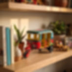 Hand painted wooden rickshaw on a shelf by Balaji Handicraft