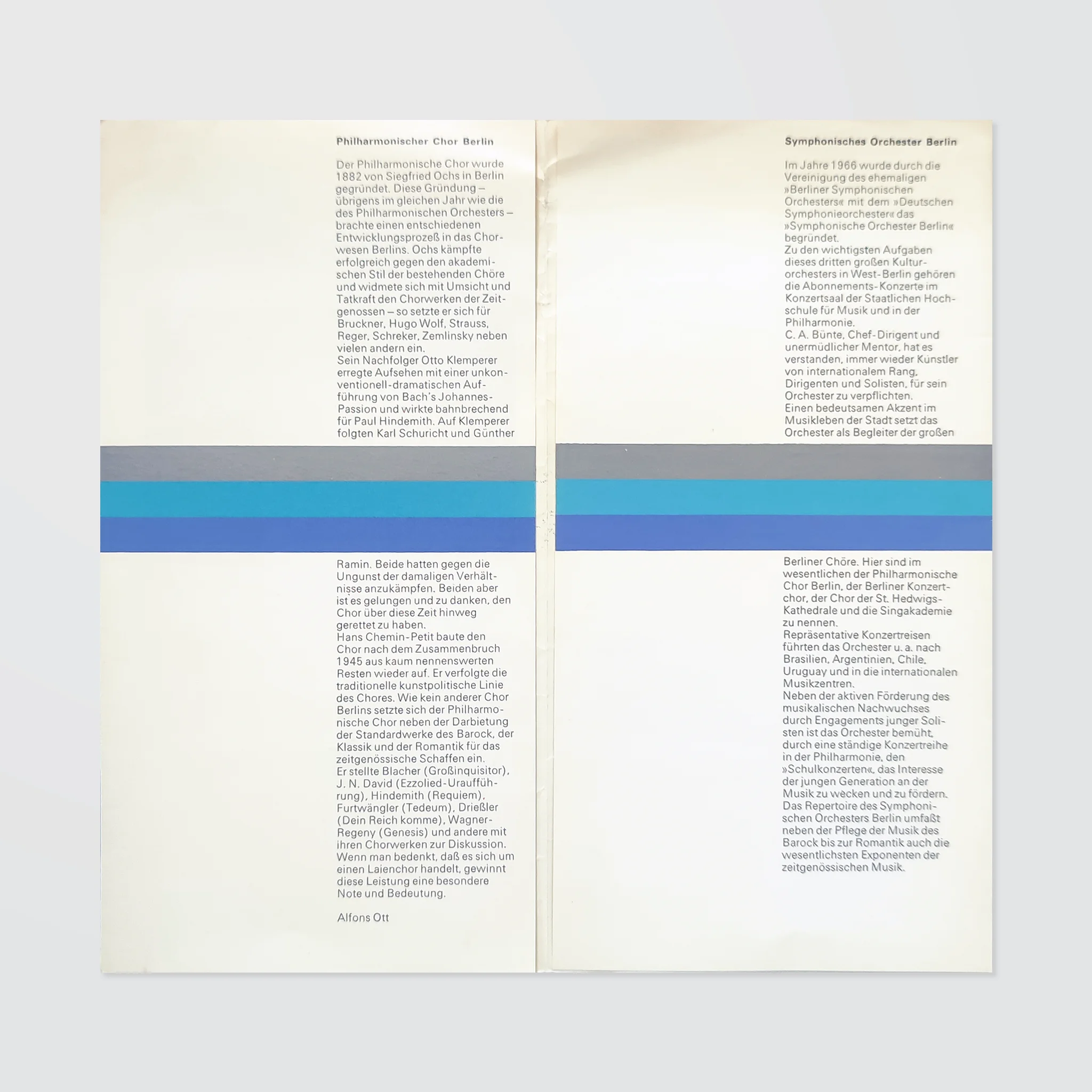Open booklet with German text on both pages. Blue and silver horizontal stripes divide the text. Simple, minimalistic design.