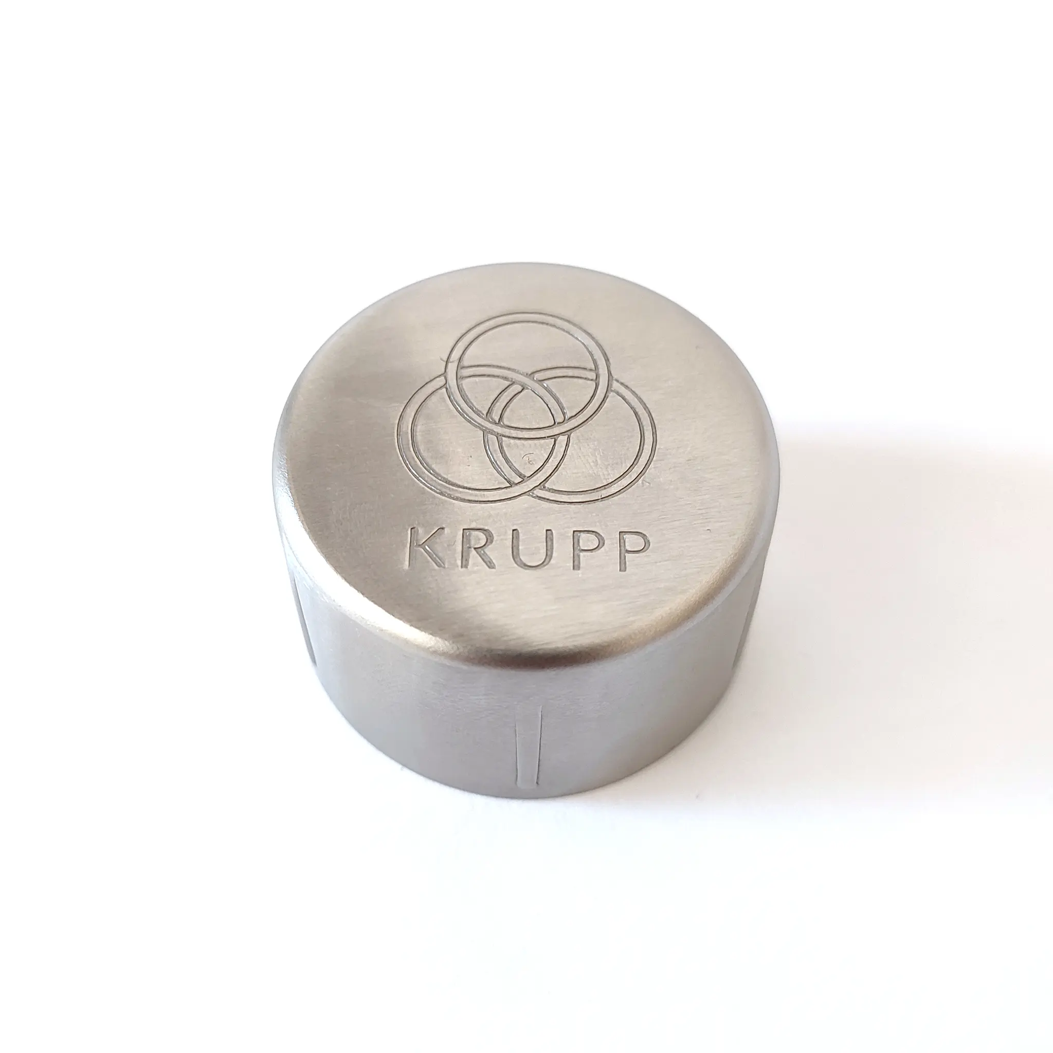 Krupp logo etched on the steel end cap of the Olympic torch