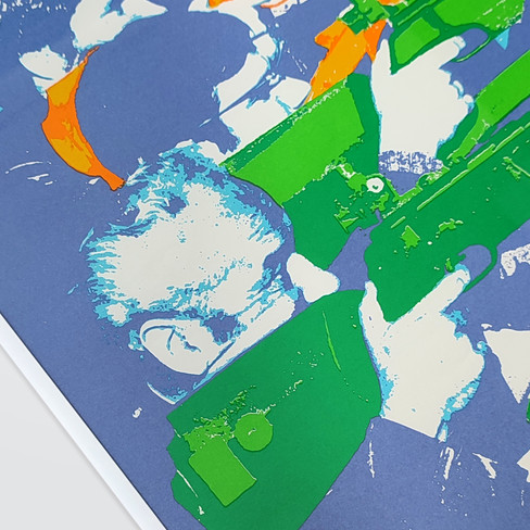 Abstract artwork with vibrant green, orange, and blue shapes on a purple background. The design features overlapping, dynamic patterns.