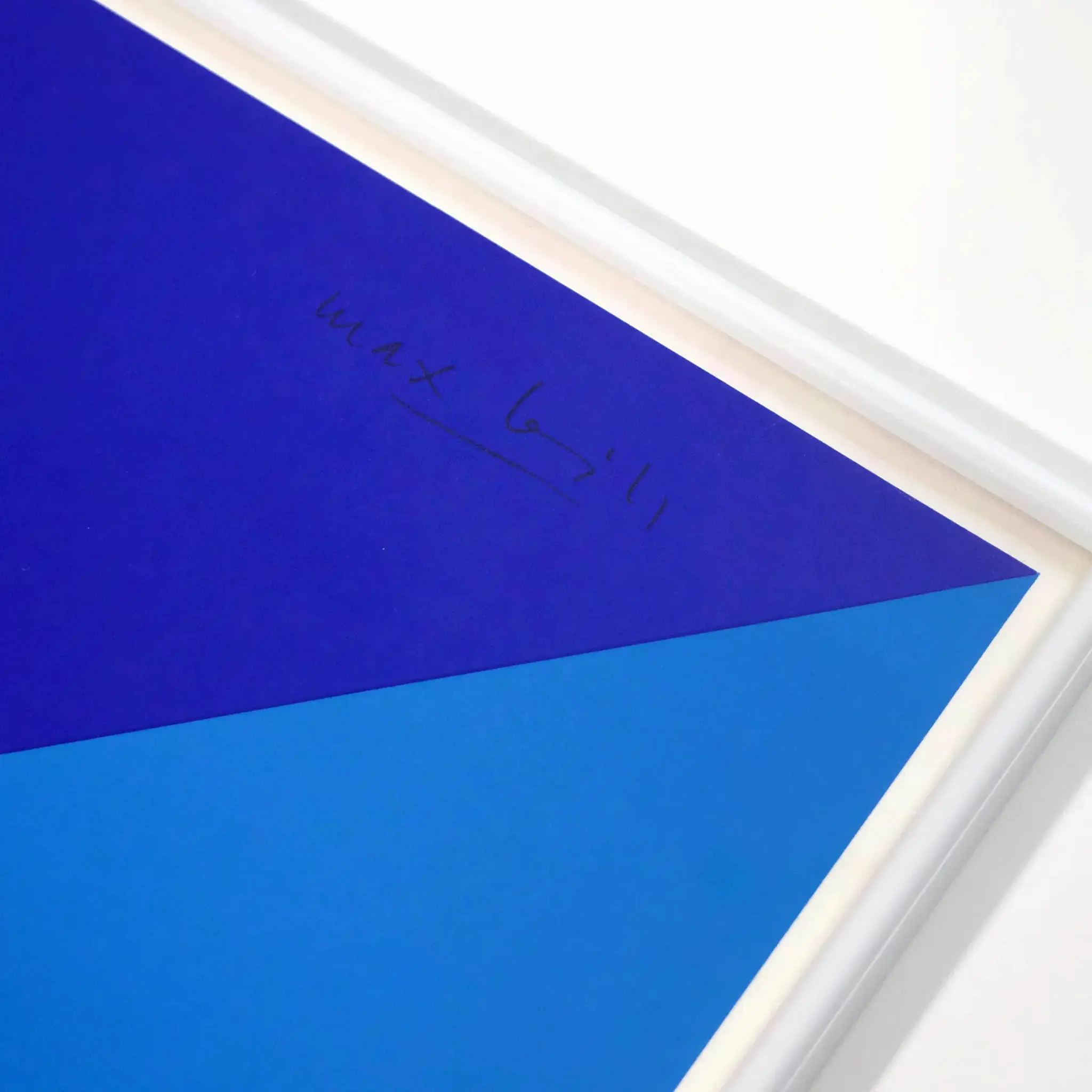Abstract artwork with blue geometric shapes in a white frame. Max Bill signature visible on deep blue section. Minimalist and modern.