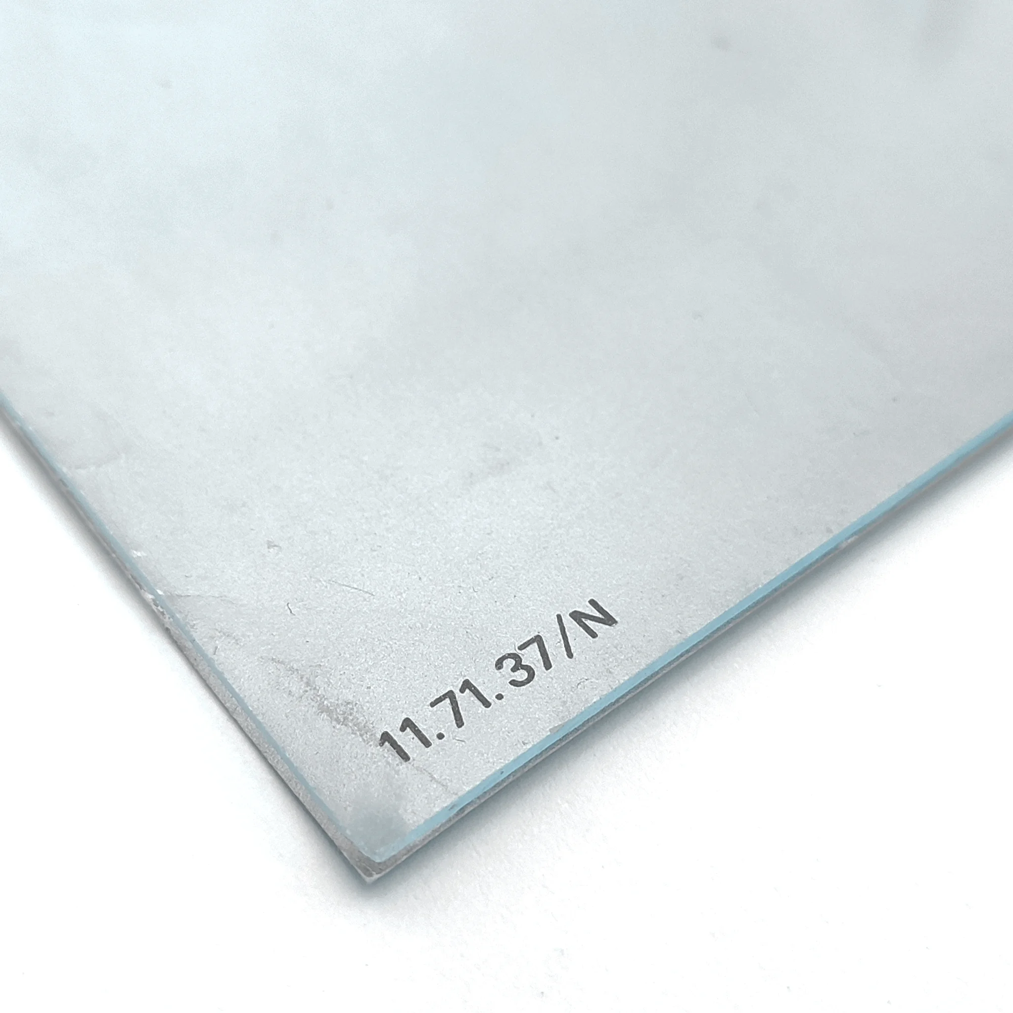 Close-up of a metallic silver poster labeled 11.71.37/N on a white background.