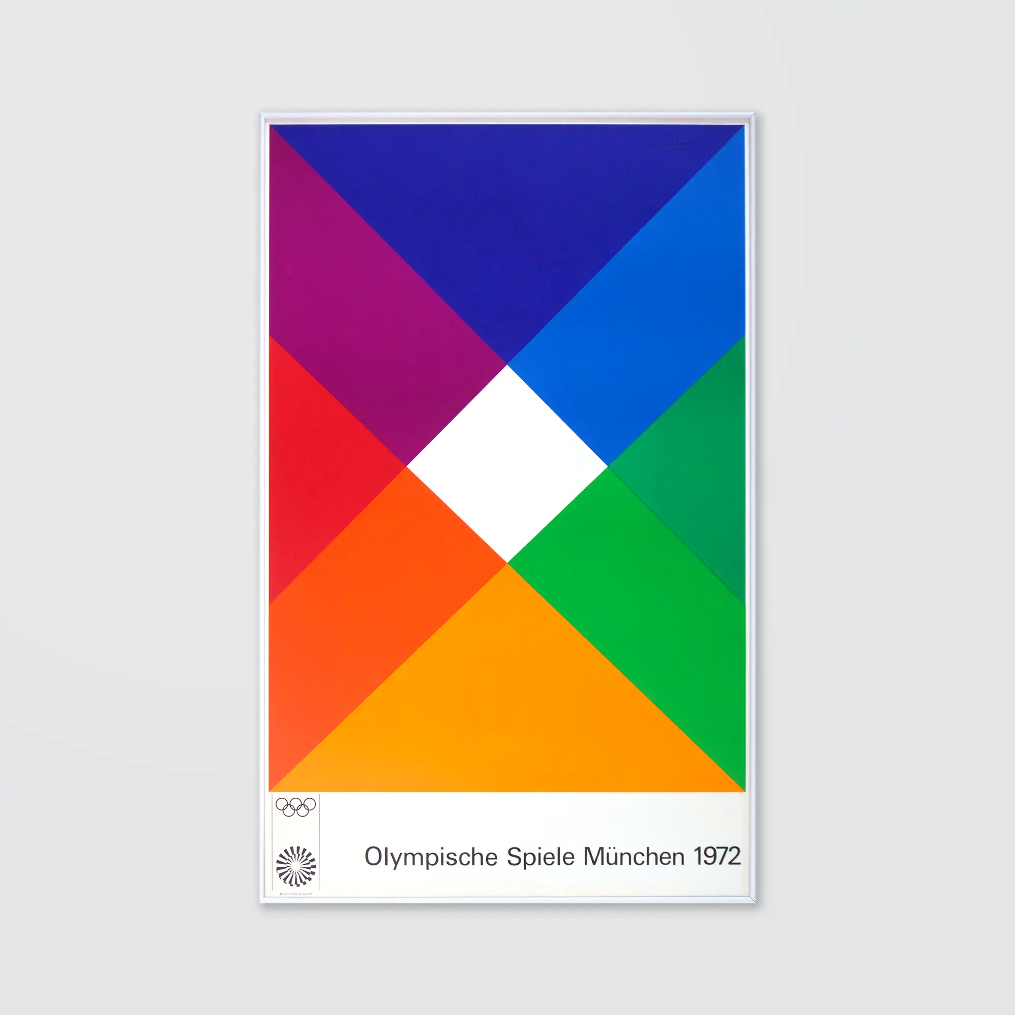 A geometric layout of colours drawing the viewer to a white rhombus in the centre
