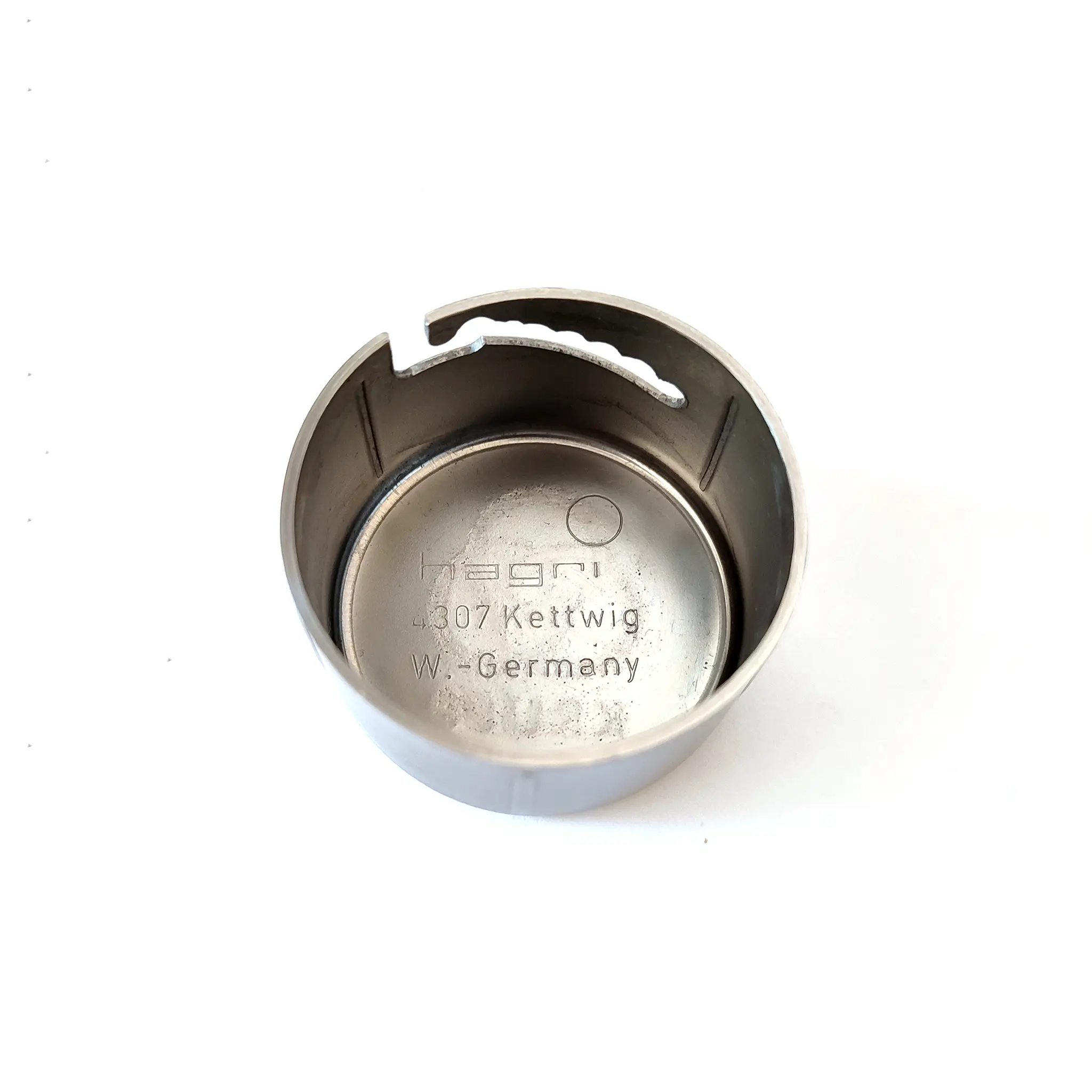 Hagri text etched on the inside of the steel end cap of the Olympic torch