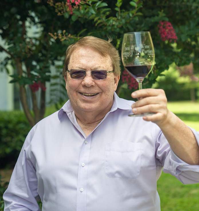 Orson saying hello with wine in hand!