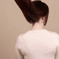 Woman with long brunette hair.