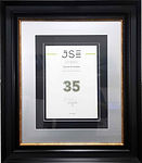 Premium certificate framing, black and gold frame with silver and black mountings.