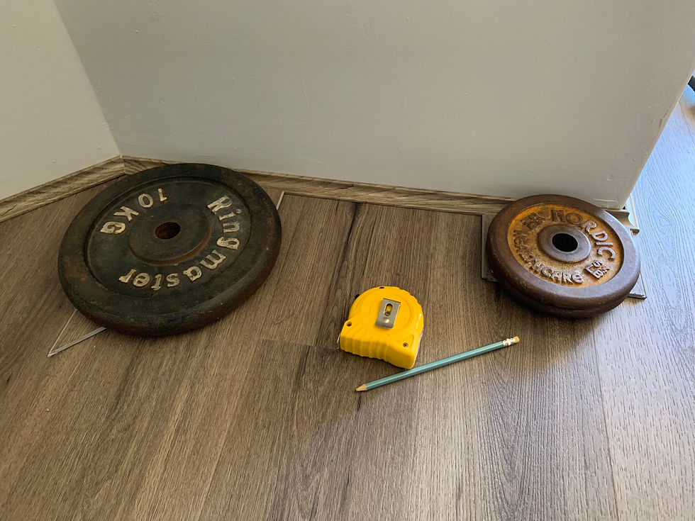 Using weights to hold scotia in place while the glue dries
