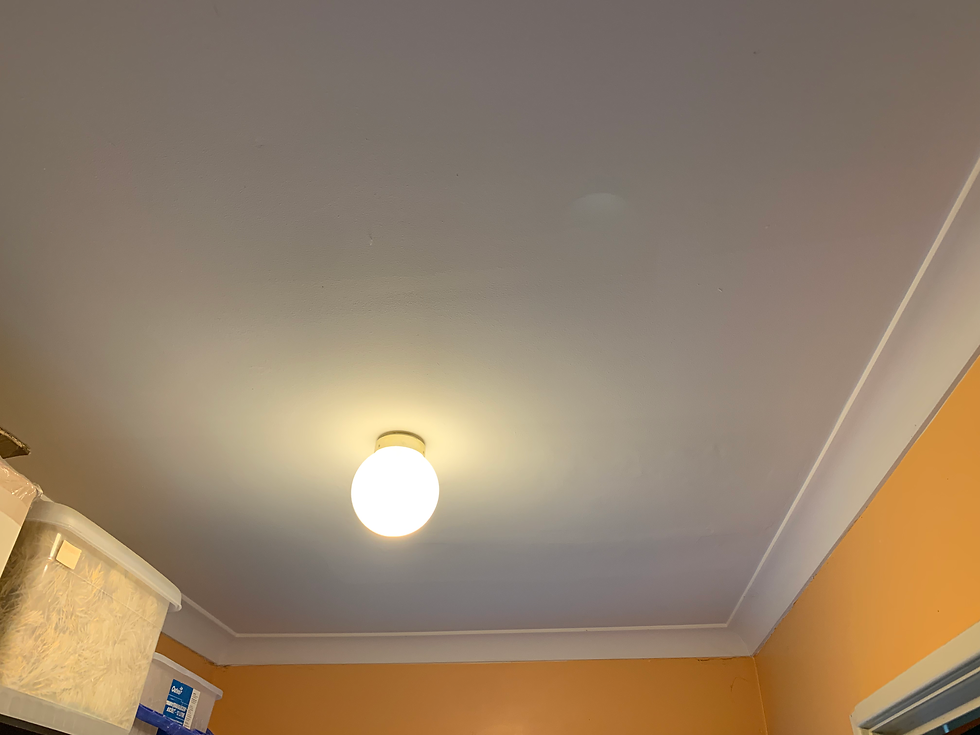 Successfully patched laundry ceiling with the light on