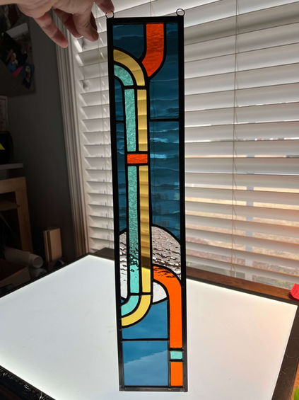 Abstract stained glass art with orange, blue and yellow colors Spectrums By Suzi