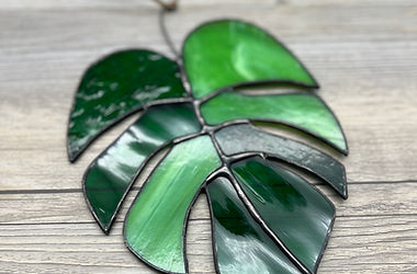 Stained glass monstera leaf hanging decoration, shades of green, Spectrums By Suzi.