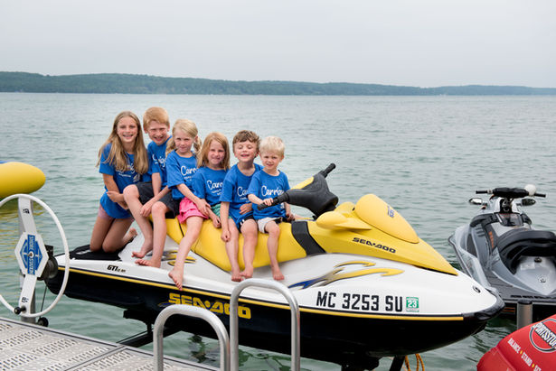children on a sea-doo