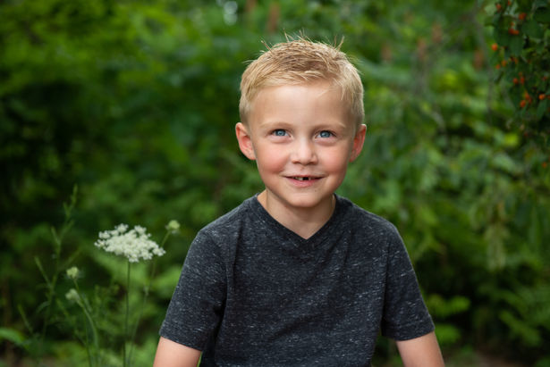 little boy smiling
