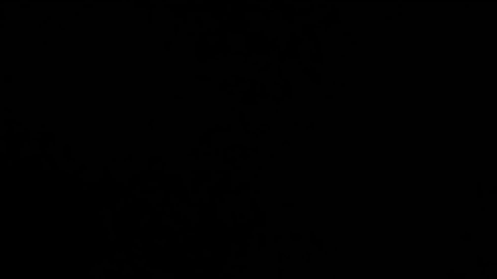 hand-sprays-water-mist-on-black-background-2025-12-17-05-10-20-utc.mov