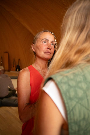 Woman channeling sound in ceremony during Sounds of Light healing retreat