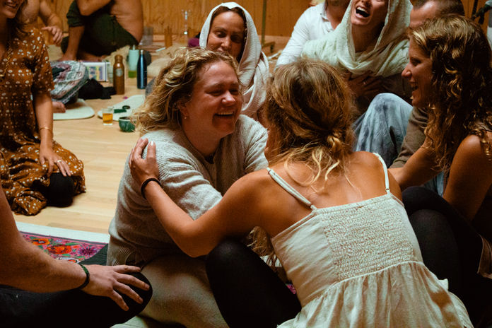 Woman channeling sound in ceremony during Sounds of Light healing retreat